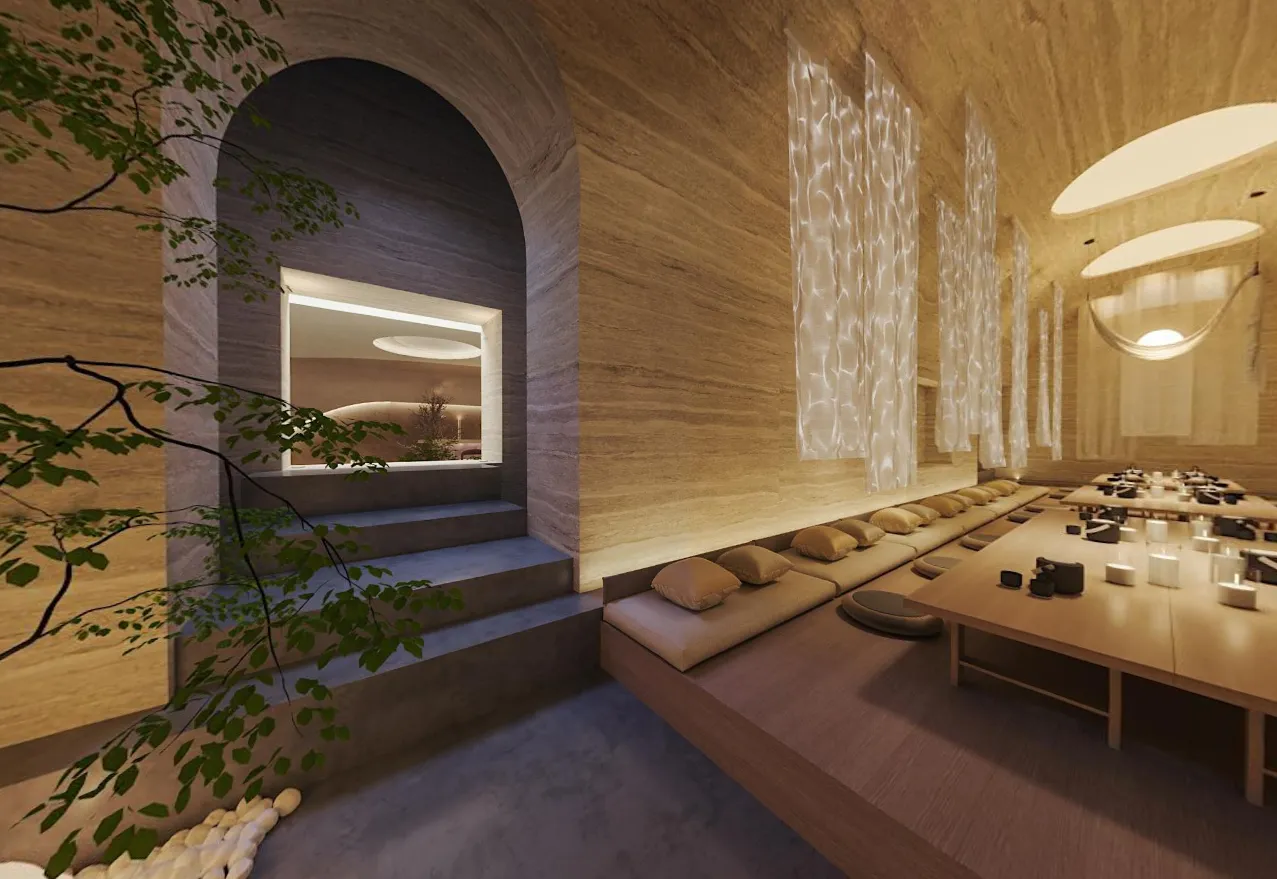 Communal dining room with travertine arch at Moonrise